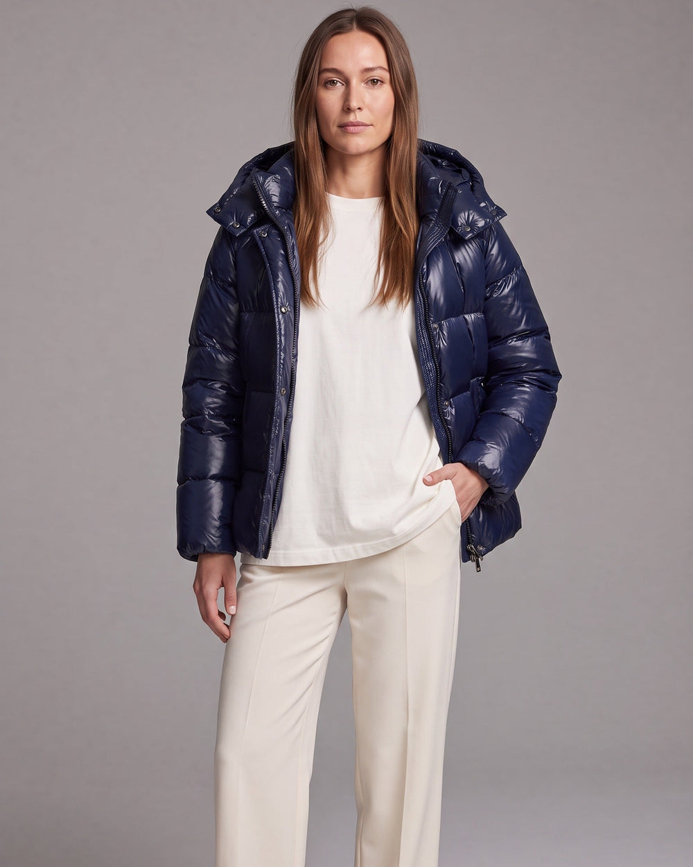 Women's hooded quilted puffer coat with long sleeves and front zipper