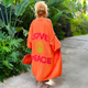 Women's oversized longline cardigan with LOVE PEACE graphic on the back
