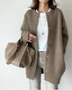 Women's longline button-front cardigan with crew neckline and long sleeves
