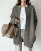 Women's longline button-front cardigan with crew neckline and long sleeves