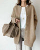 Women's longline button-front cardigan with crew neckline and long sleeves