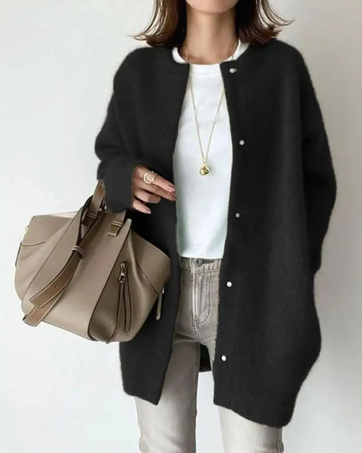 Women's longline button-front cardigan with crew neckline and long sleeves