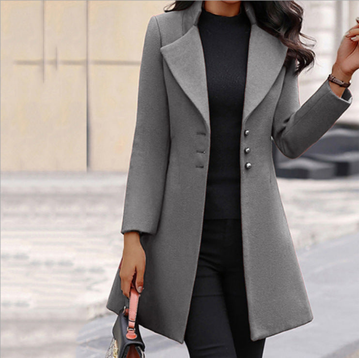 Women's longline tailored coat with notched lapels and button front