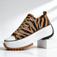 Women's platform sneakers with lace-up fronts, contrast toe caps and ridged soles