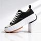 Women's platform sneakers with lace-up fronts, contrast toe caps and ridged soles