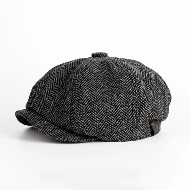 Octagonal herringbone newsboy cap with short brim and button top