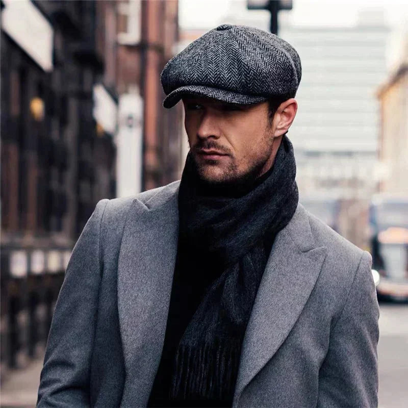 Octagonal herringbone newsboy cap with short brim and button top