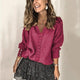Women's ribbed V-neck button front sweater with long sleeves and cuff buttons