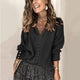 Women's ribbed V-neck button front sweater with long sleeves and cuff buttons