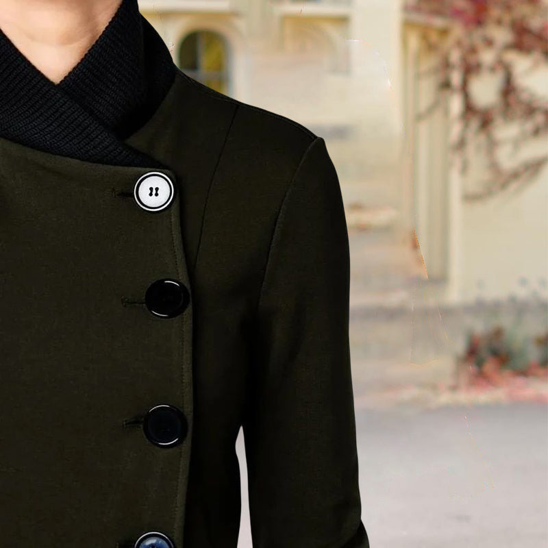 Women's single breasted coat with stand collar, long sleeves and curved hem